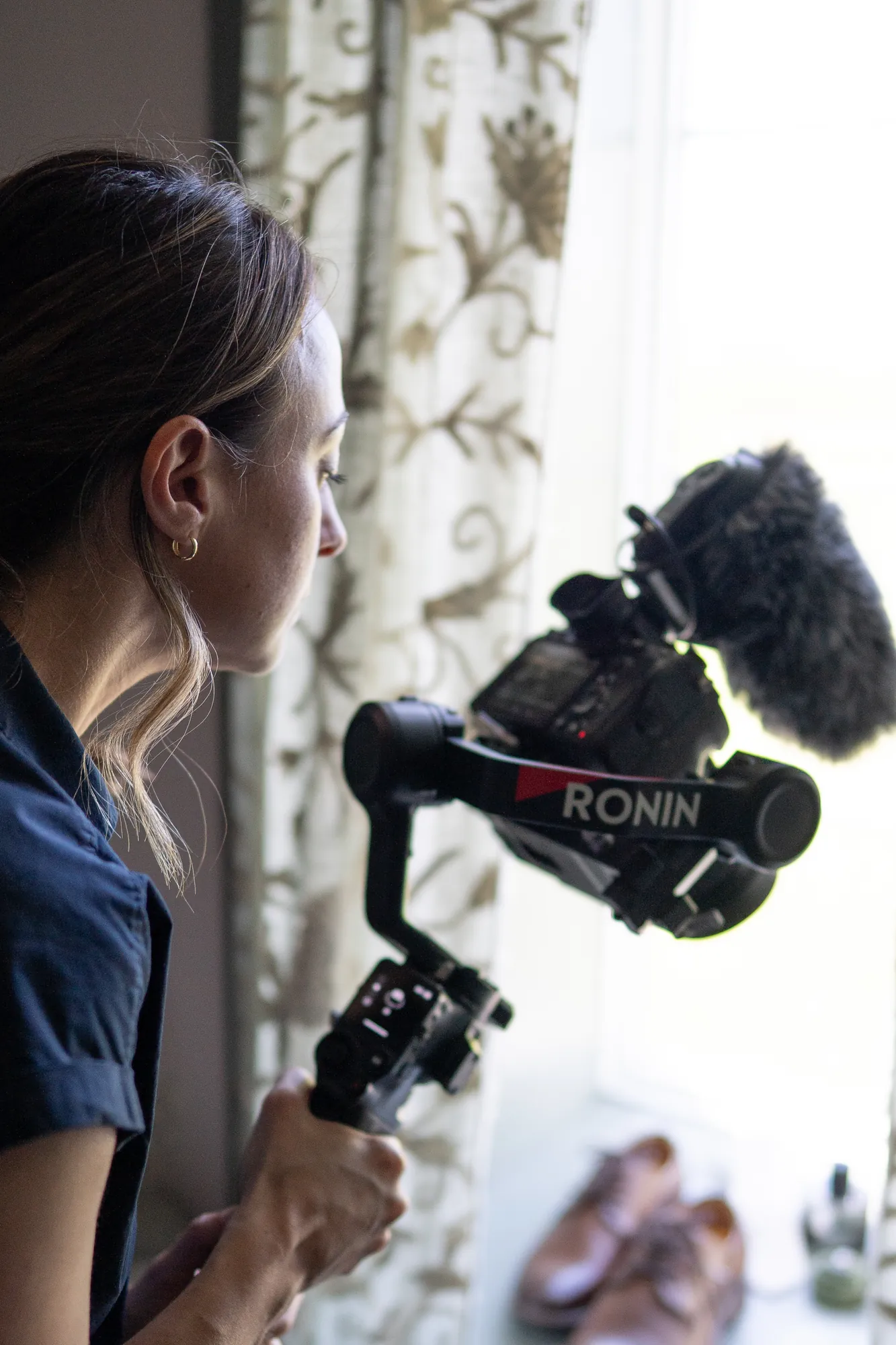 Maple Tree Films videographer filming with a Ronin gimbal during getting ready