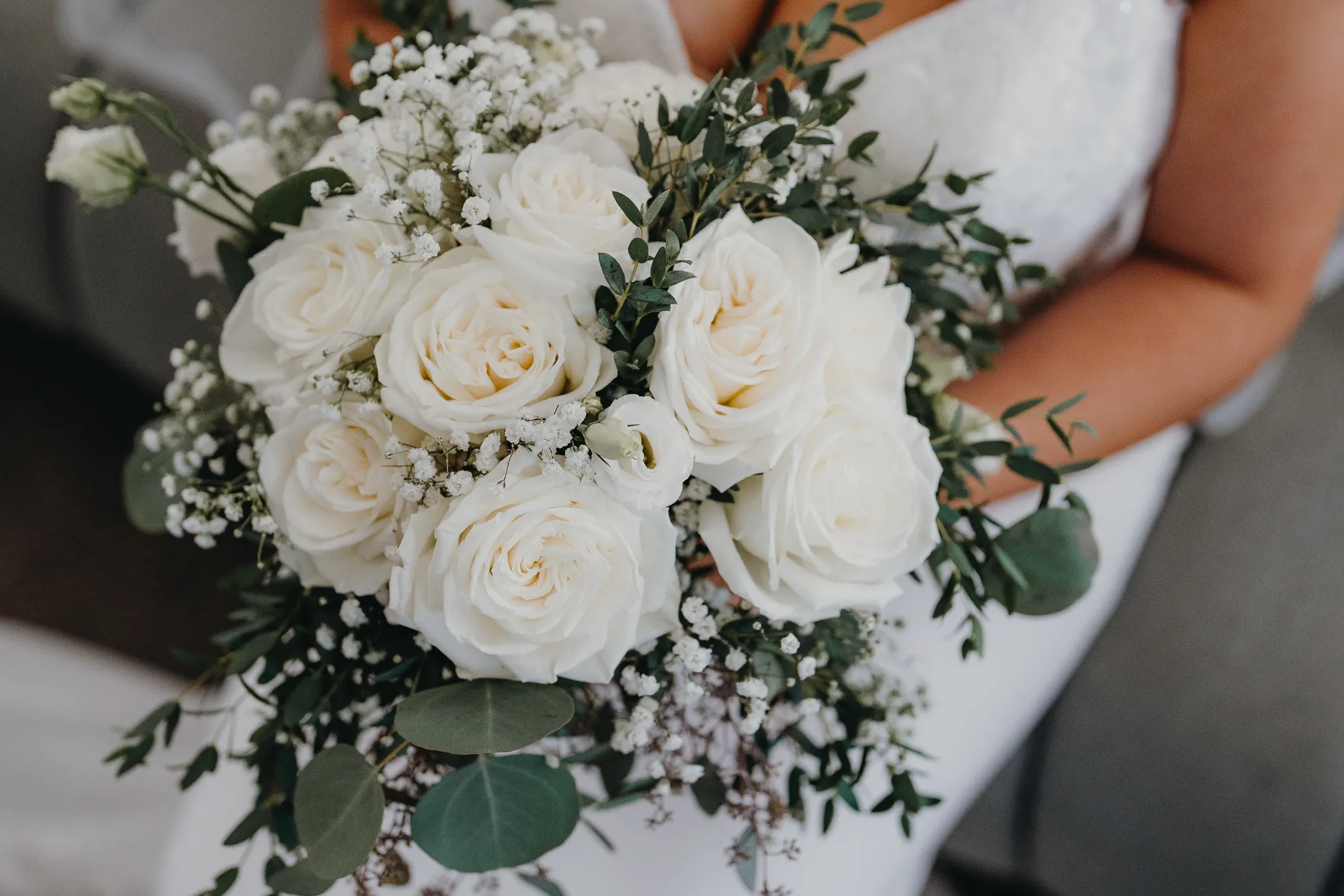 White rose and eucalyptus bridal bouquet detail